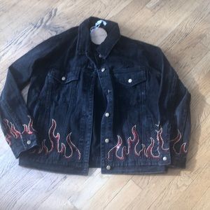 Honey punch denim jacket with red and gold studs. Open weave back. New